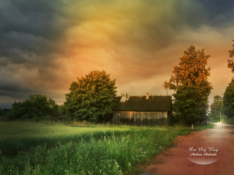 Farmhouse under stormy sky