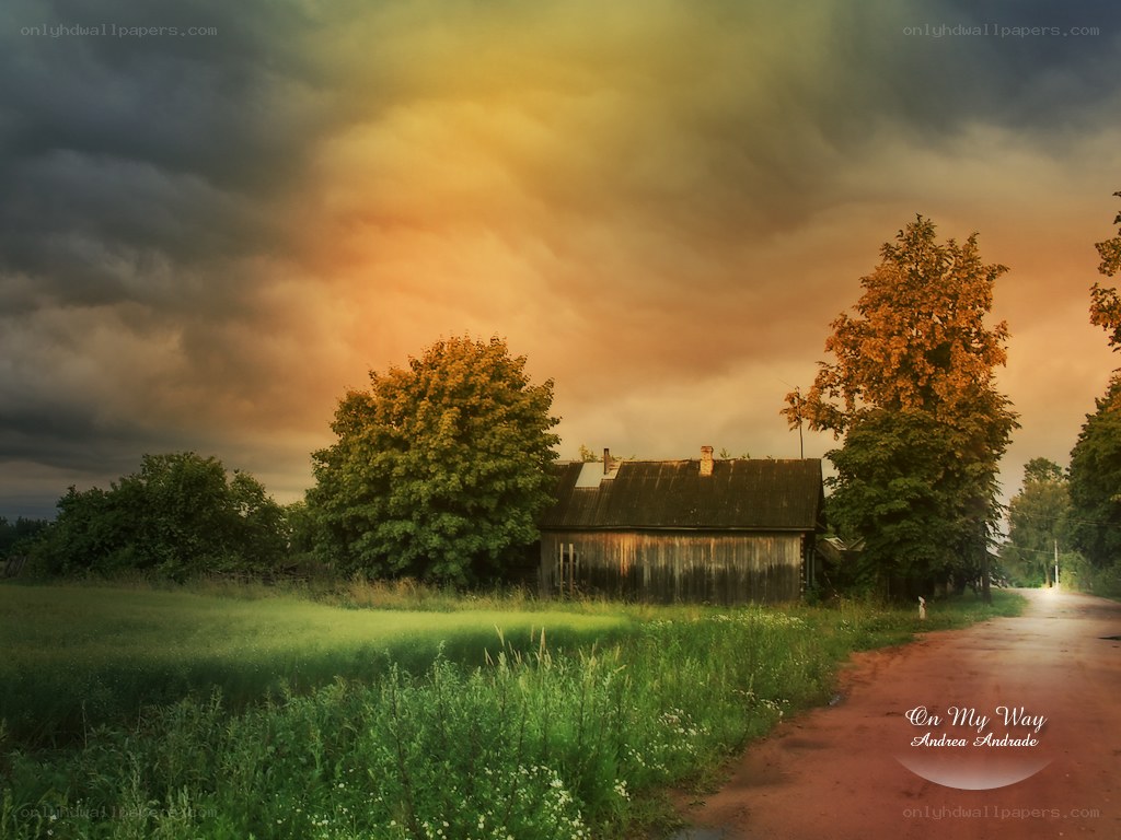 Farmhouse under stormy sky