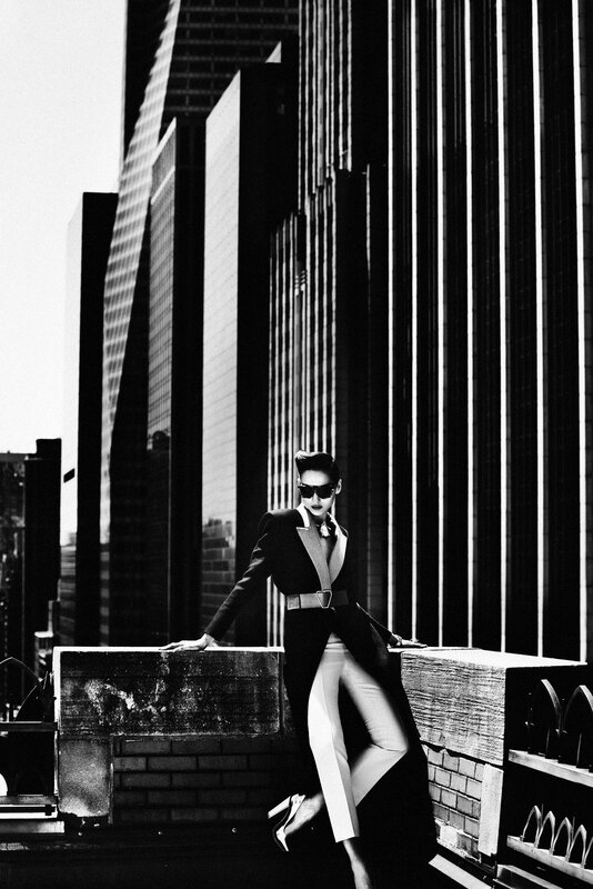Fashion model in cityscape