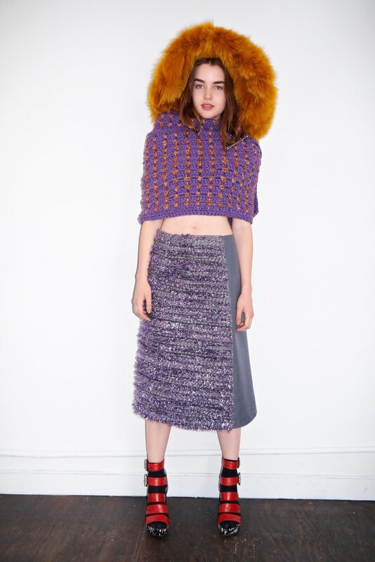 Fashion model in purple outfit
