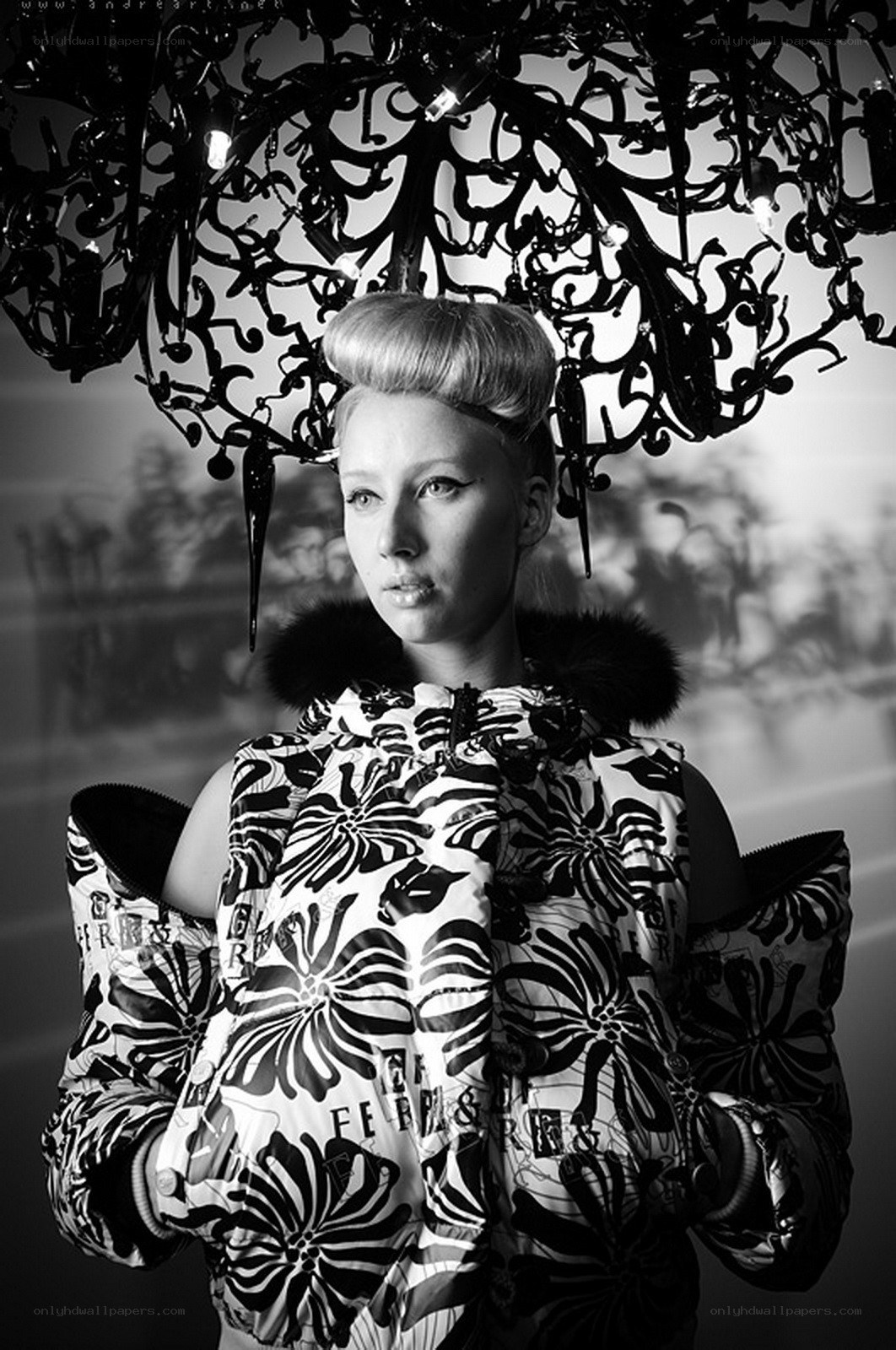 fashion model under chandelier