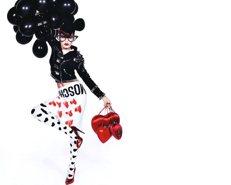 Fashion model with balloons and hearts