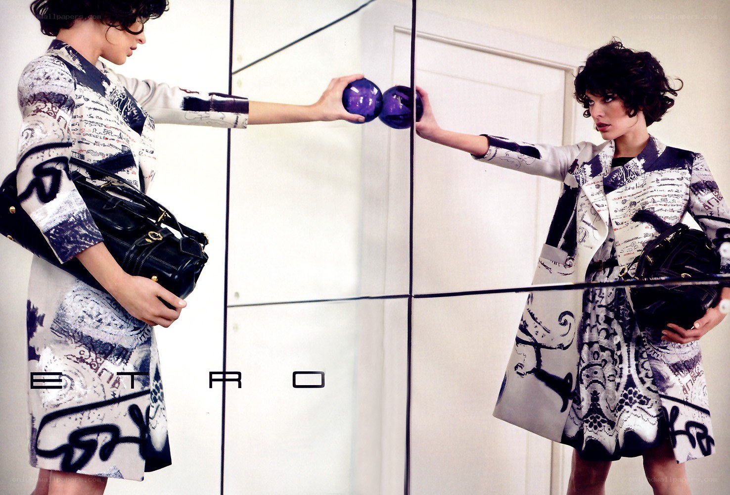 Fashion model with purple orbs
