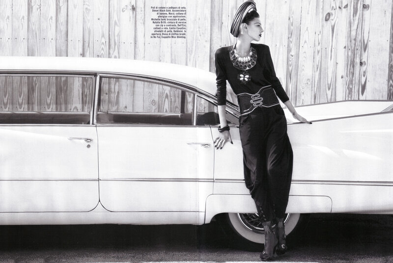 Fashion model with vintage car