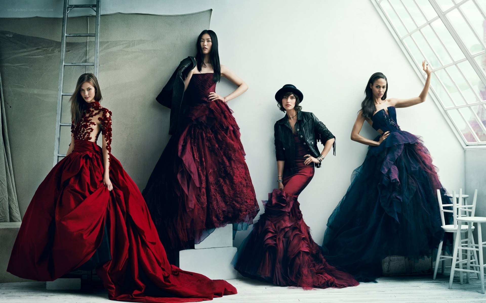 Fashion models in elegant gowns