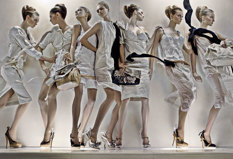 Fashion models in white dresses