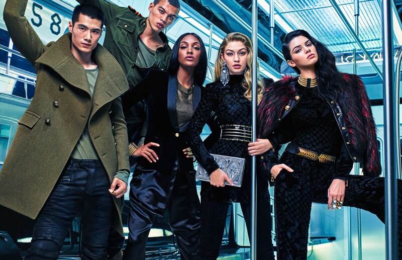 Fashion models on a train