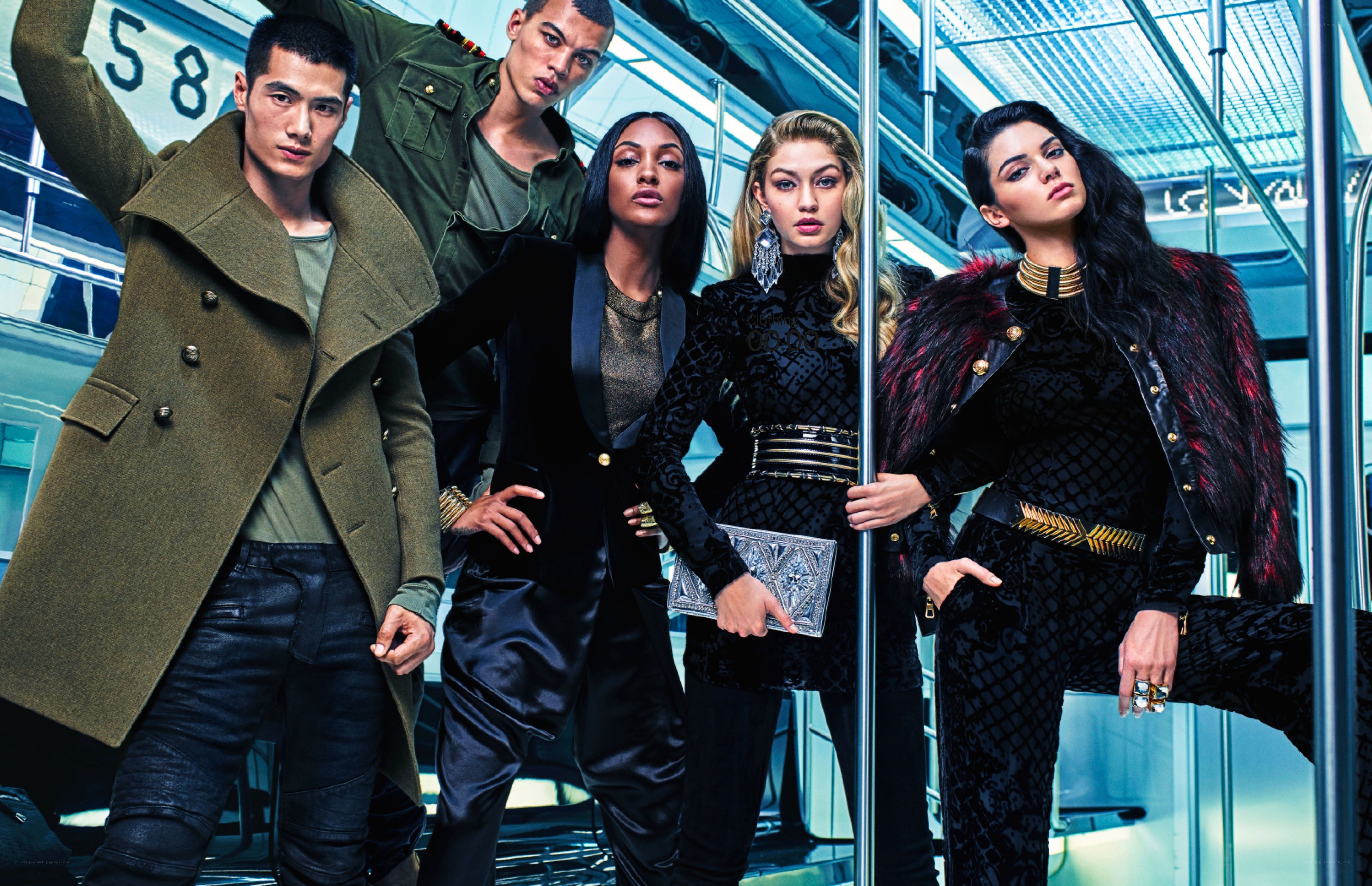 Fashion models on a train