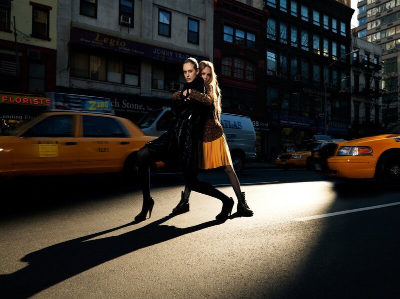 Fashion models on city street