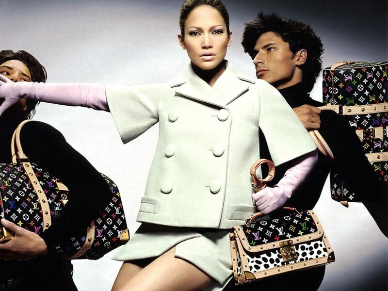 Fashion models with luxury handbags