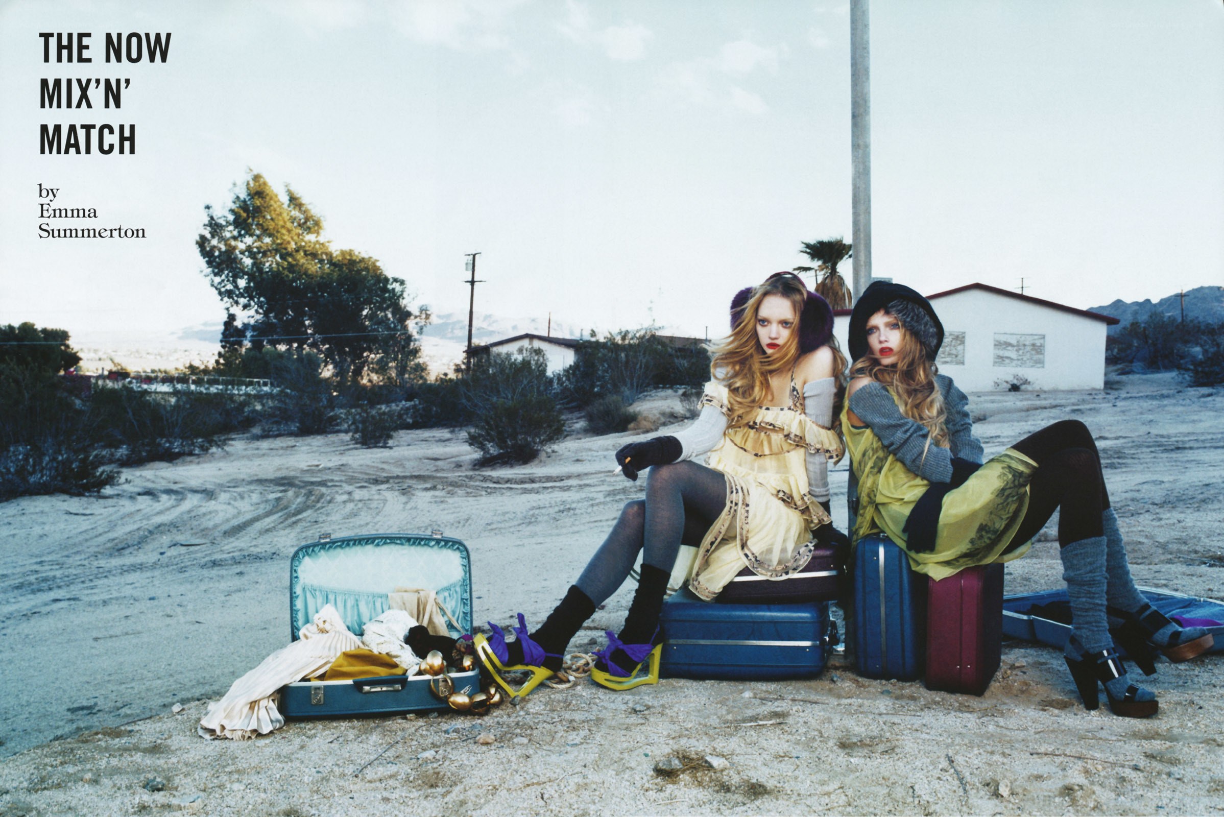 Fashion models with suitcases