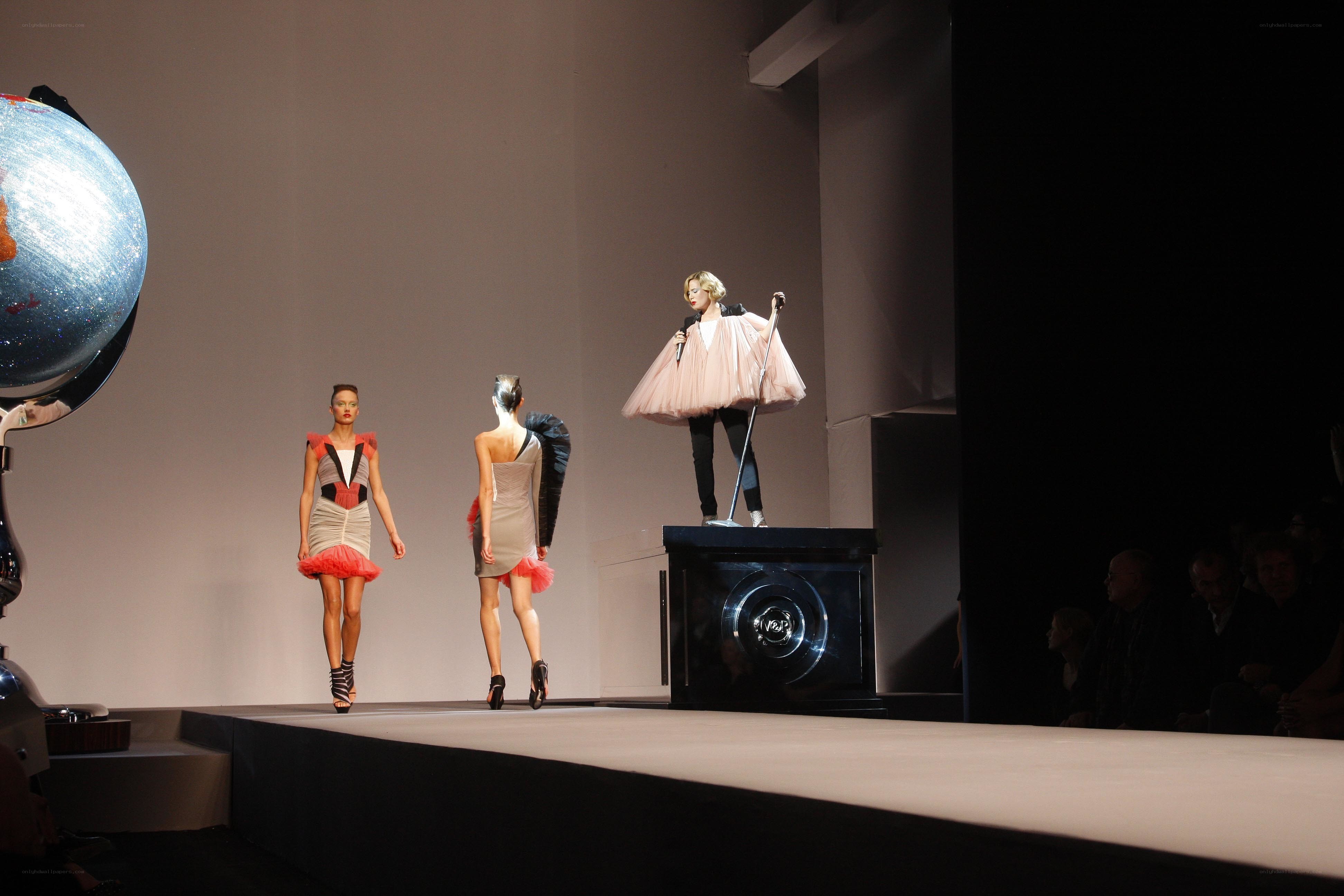 Fashion show with models and singer