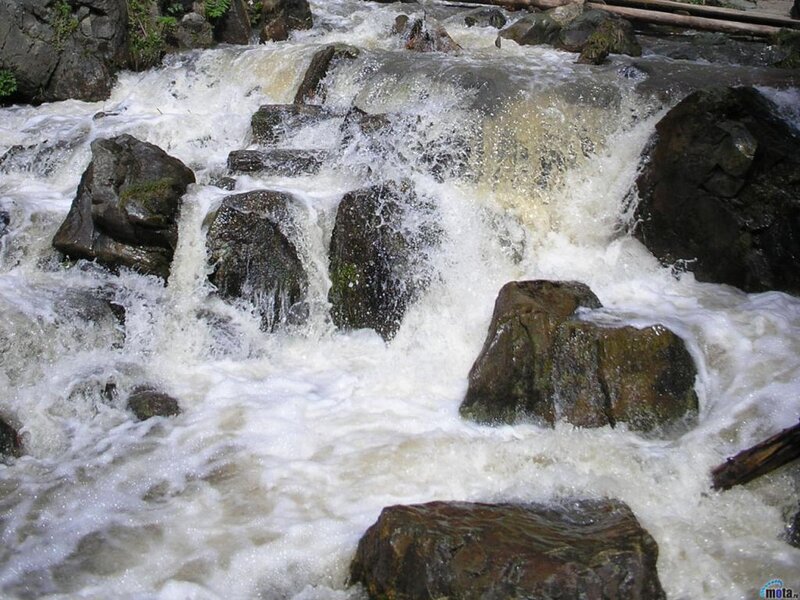 Fast-flowing River over Rocks — White