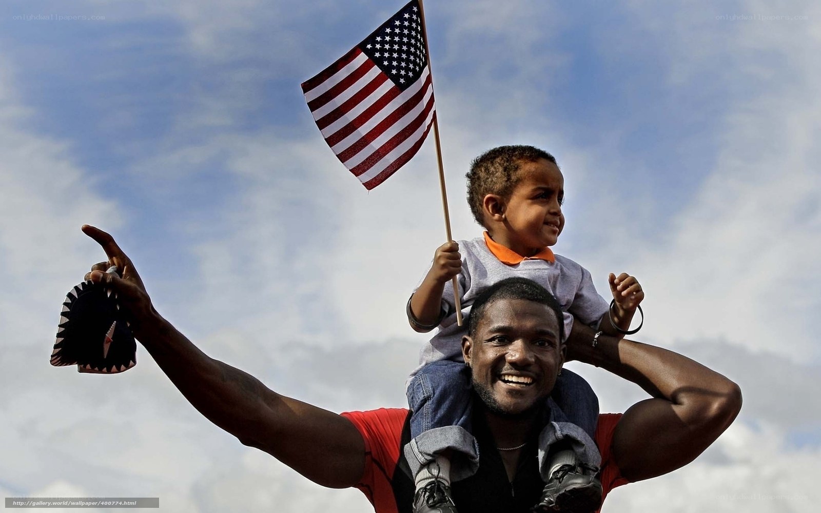 Father and son with American flag