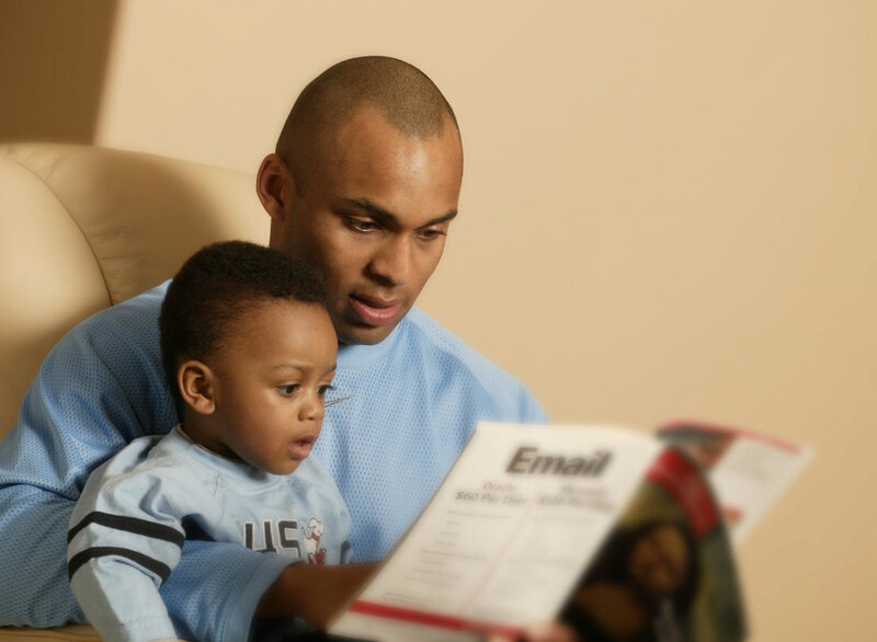 father reading to son