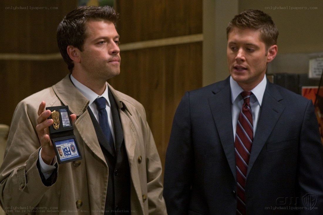FBI agents in a hallway