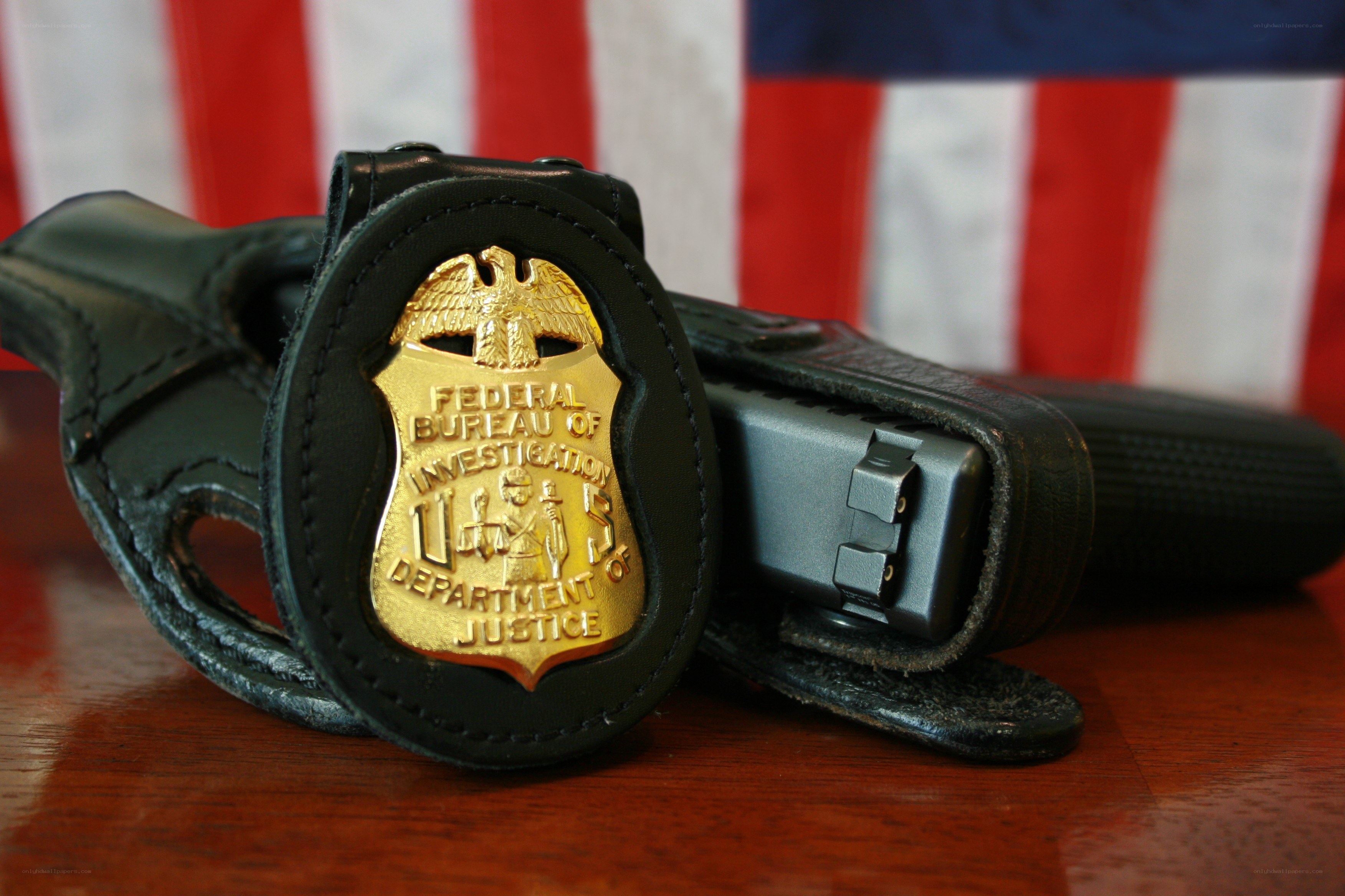 FBI badge and firearm