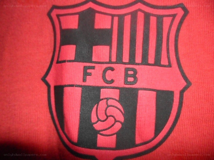 FC Barcelona crest on red fabric