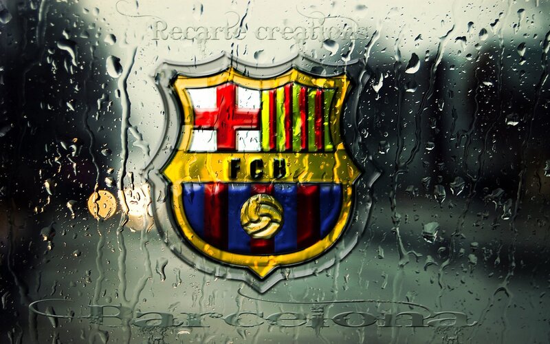 FC Barcelona logo on rainy glass