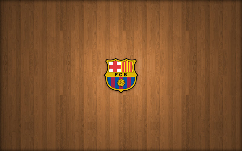 FC Barcelona logo on wood