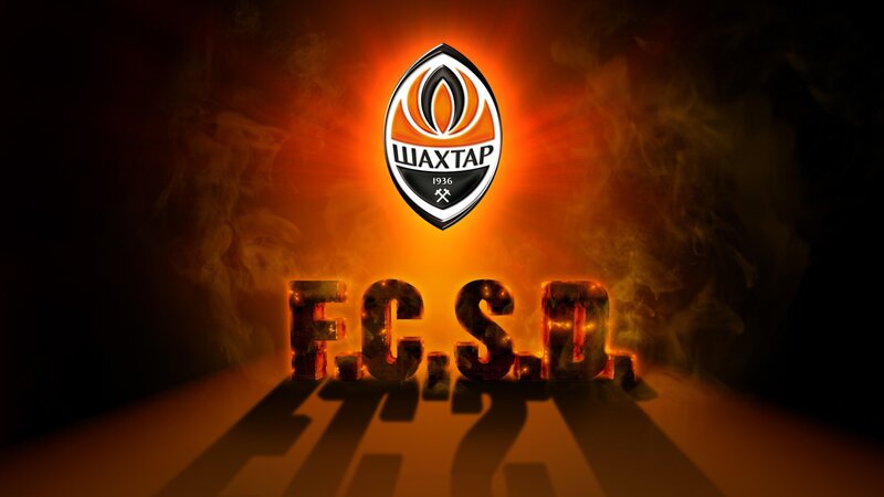 FC Shakhtar logo with fiery text