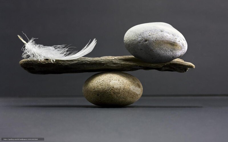 Feather and stone balance