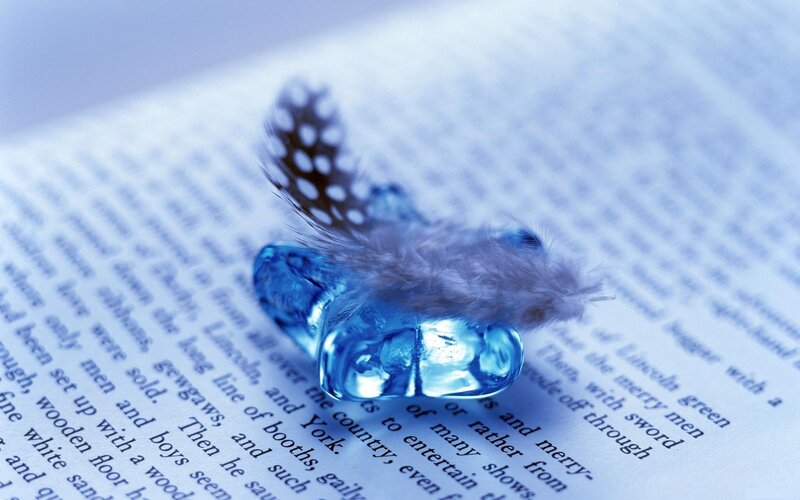 feather on blue crystal