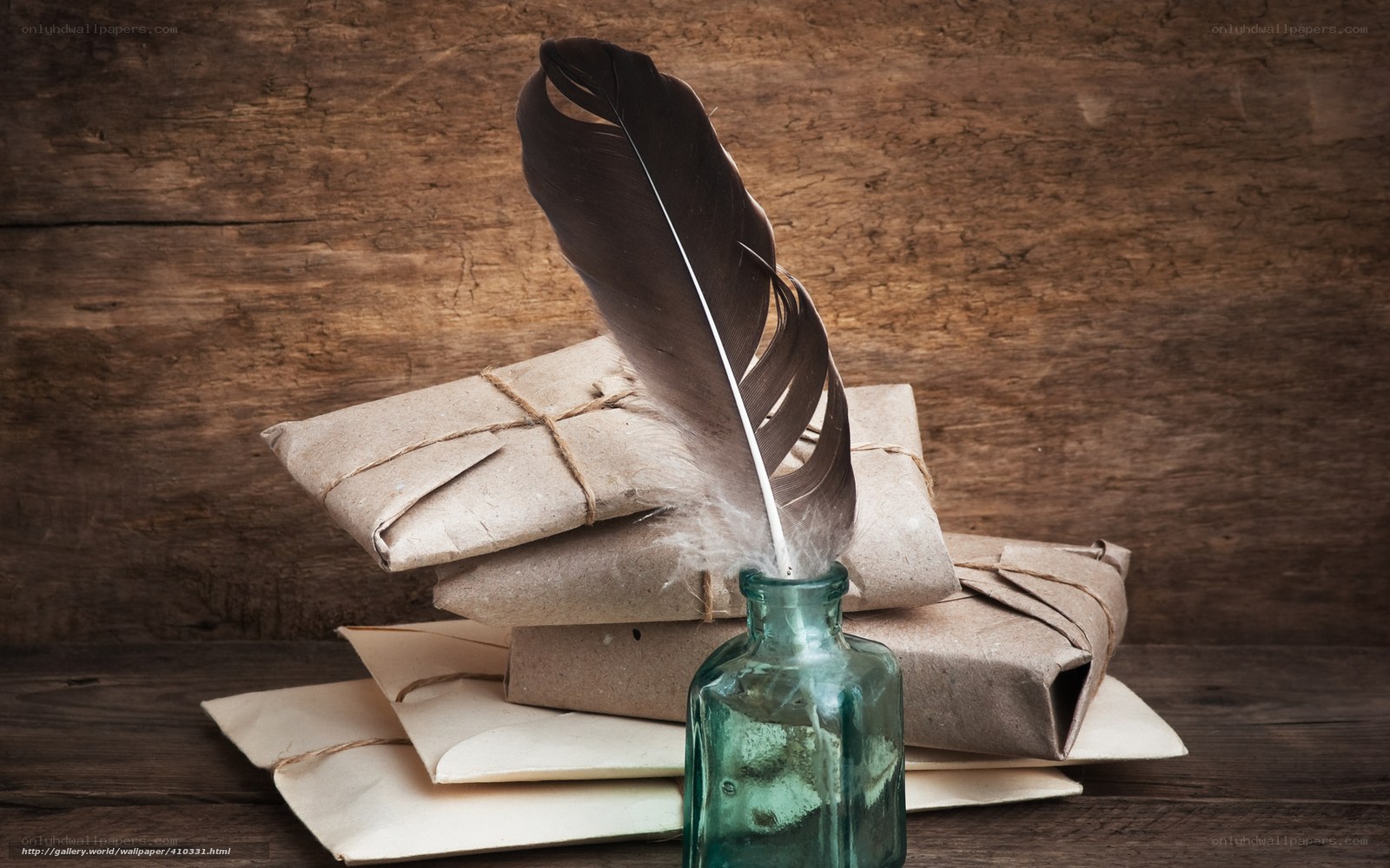 Feather quill and old letters