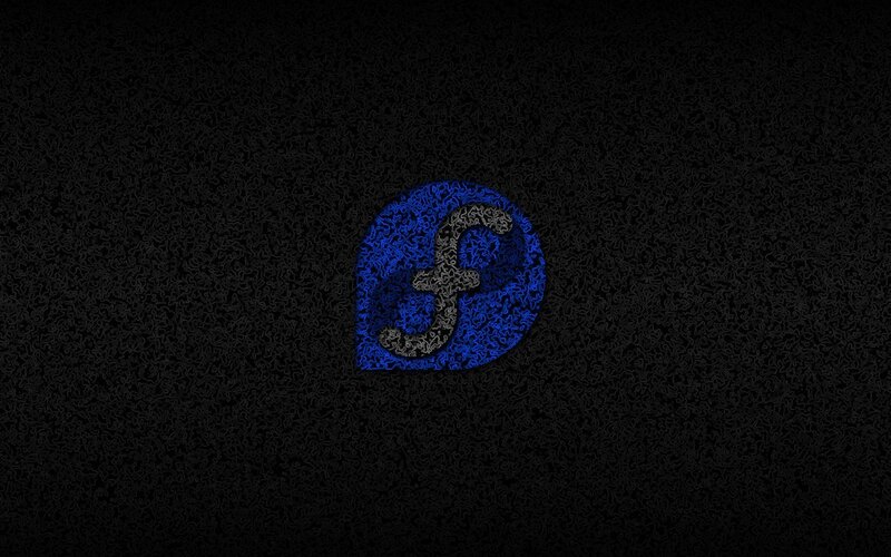 Fedora logo on dark background