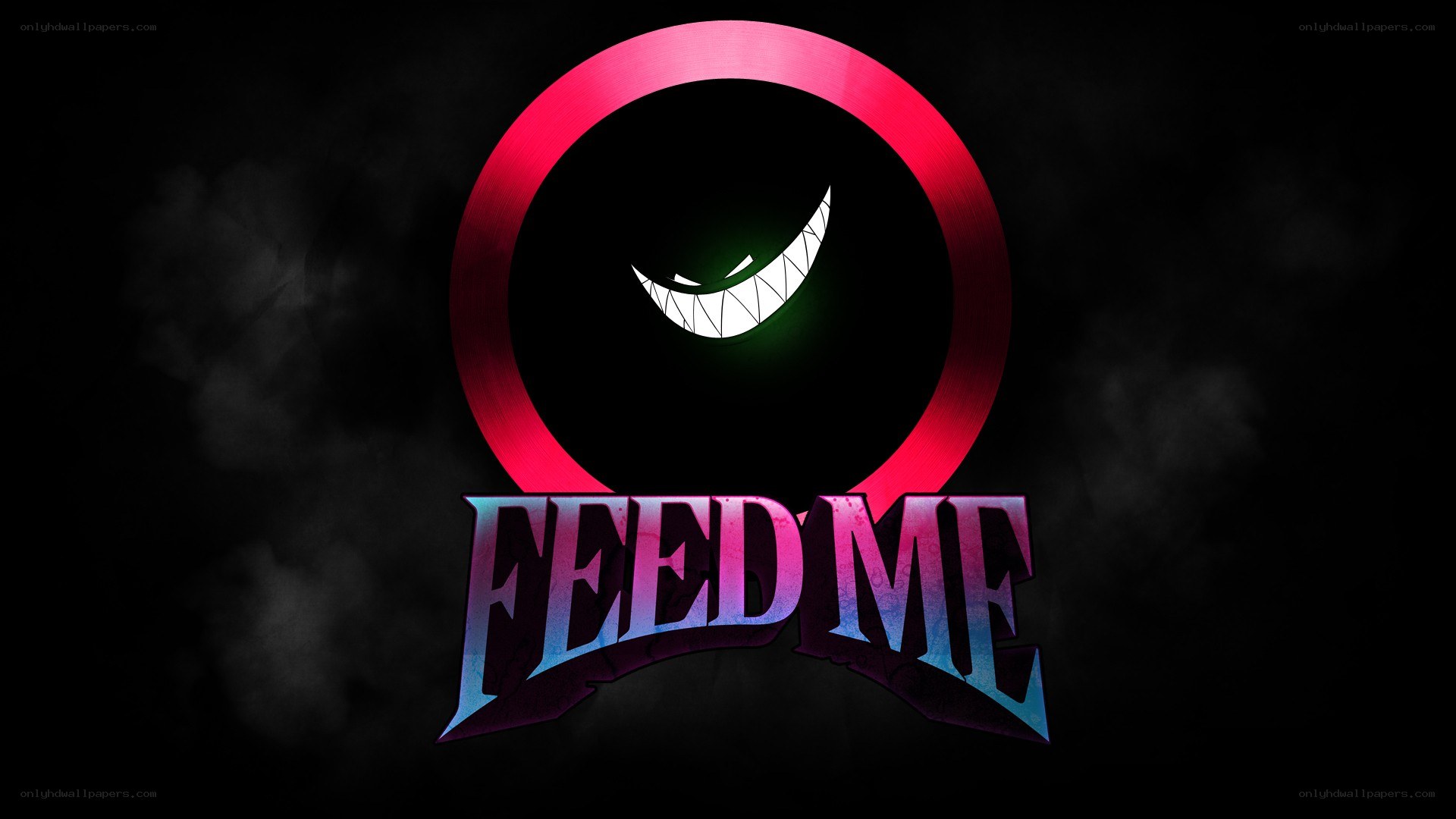 Feed Me logo with grinning face