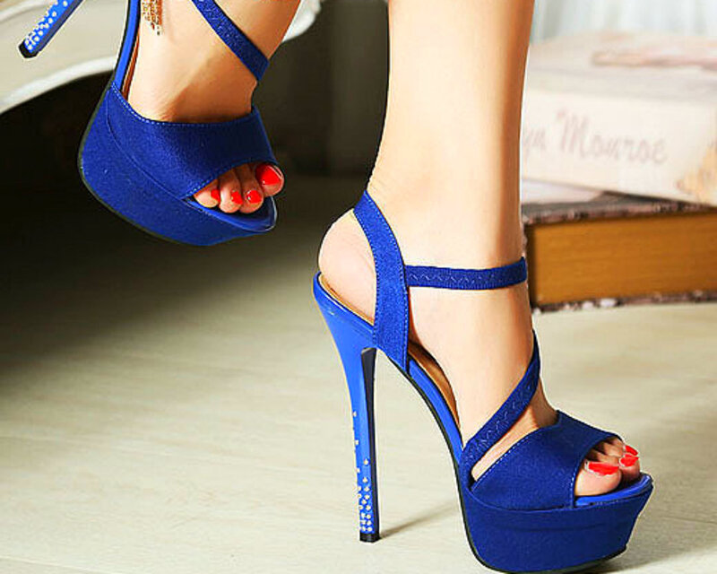 Feet in Blue High Heels