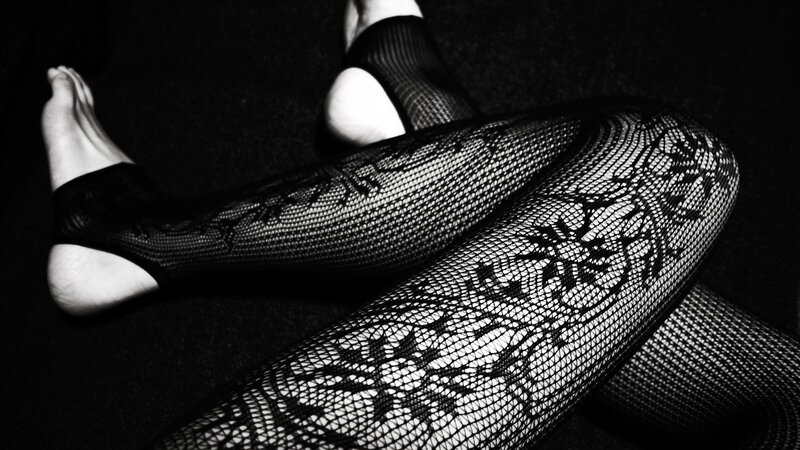 feet in fishnet stockings