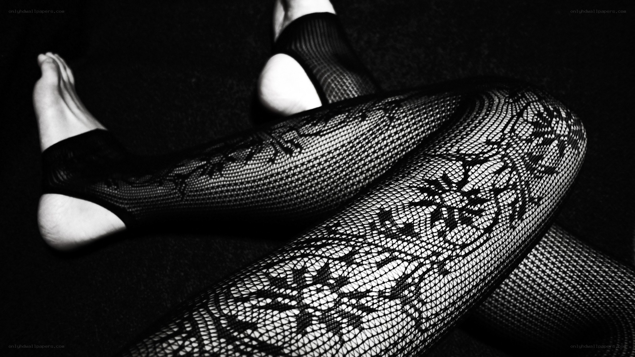 feet in fishnet stockings