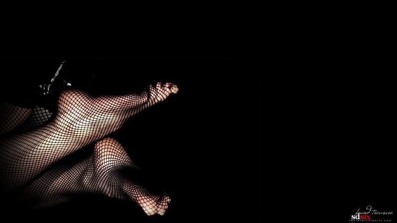feet in fishnet stockings