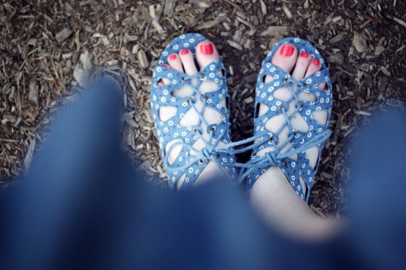 Feet in Floral Sandals — Blue