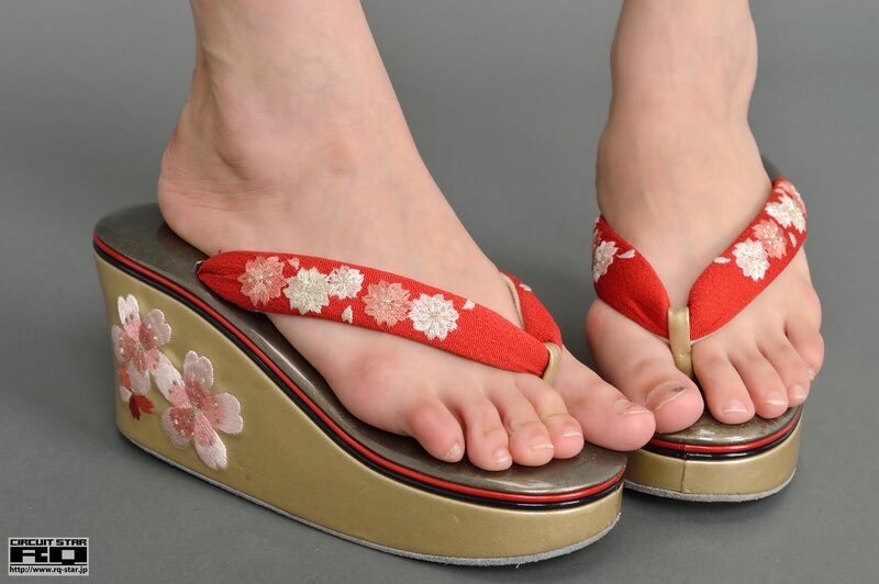 feet in floral wedge sandals