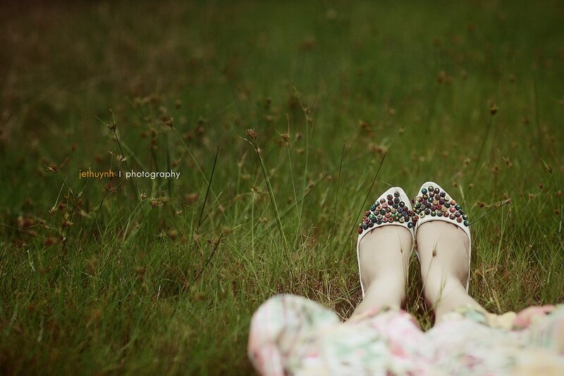feet in grass with embellished shoes
