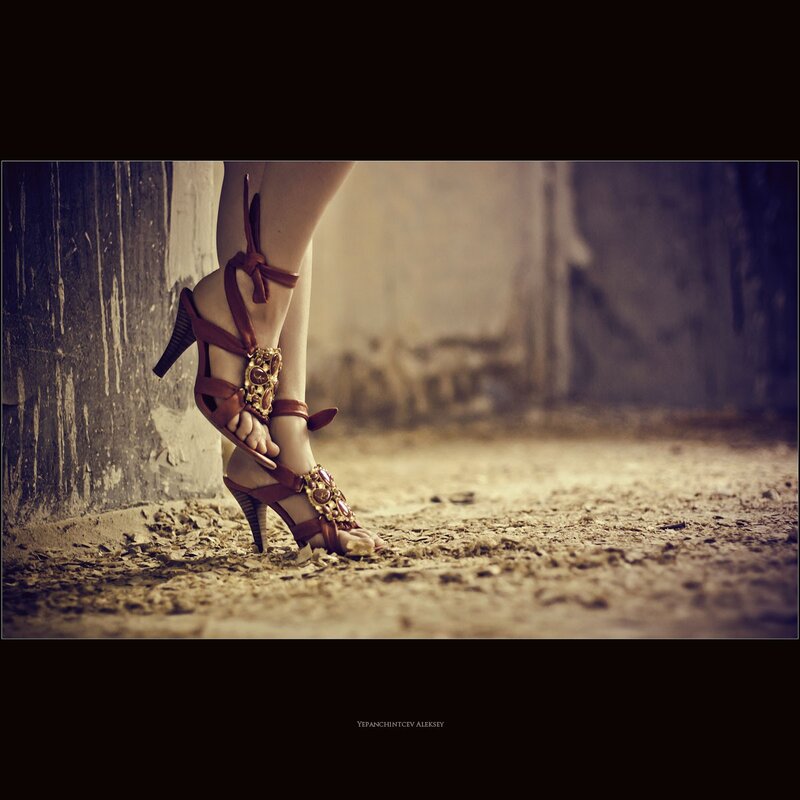 feet in ornate sandals
