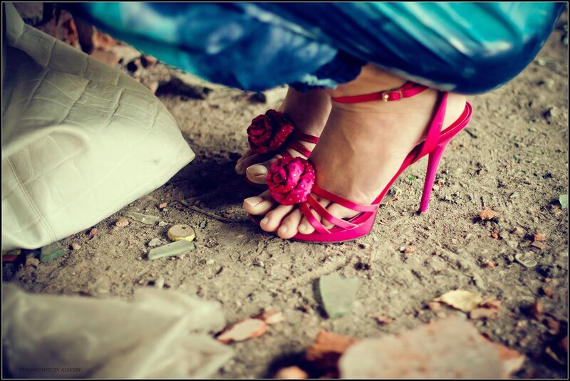 feet in pink high heels