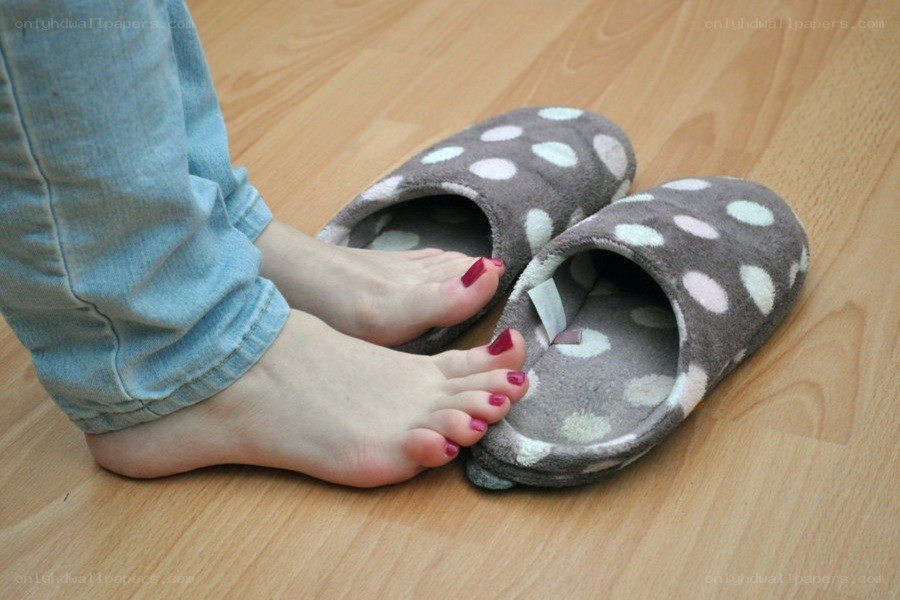 feet in polka dot slippers