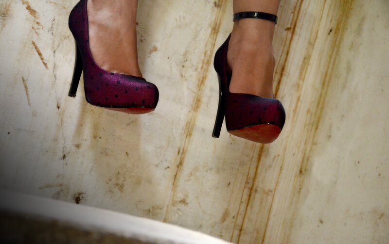 feet in purple heels