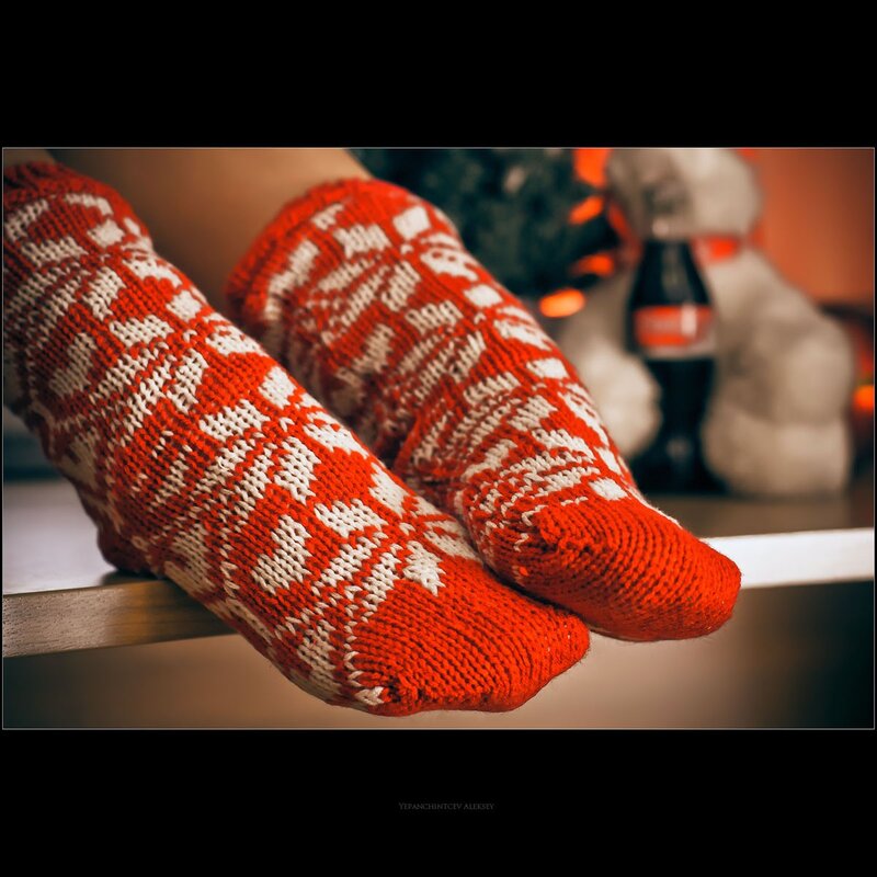 feet in red and white socks