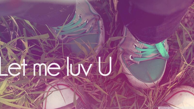 Feet in Sneakers on Grass — Purple