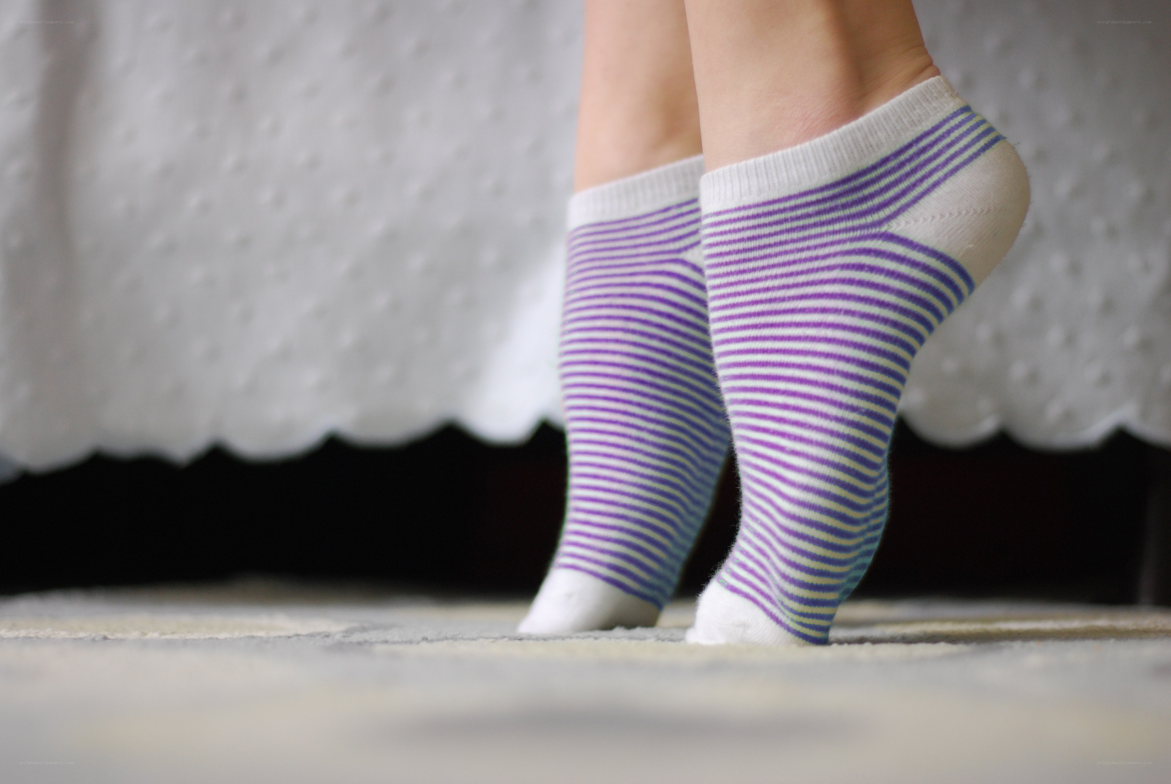 feet in striped socks
