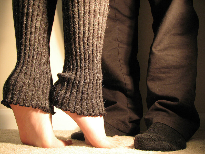 feet of two people standing