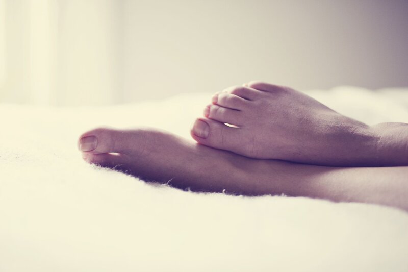 Feet on a Bed — White