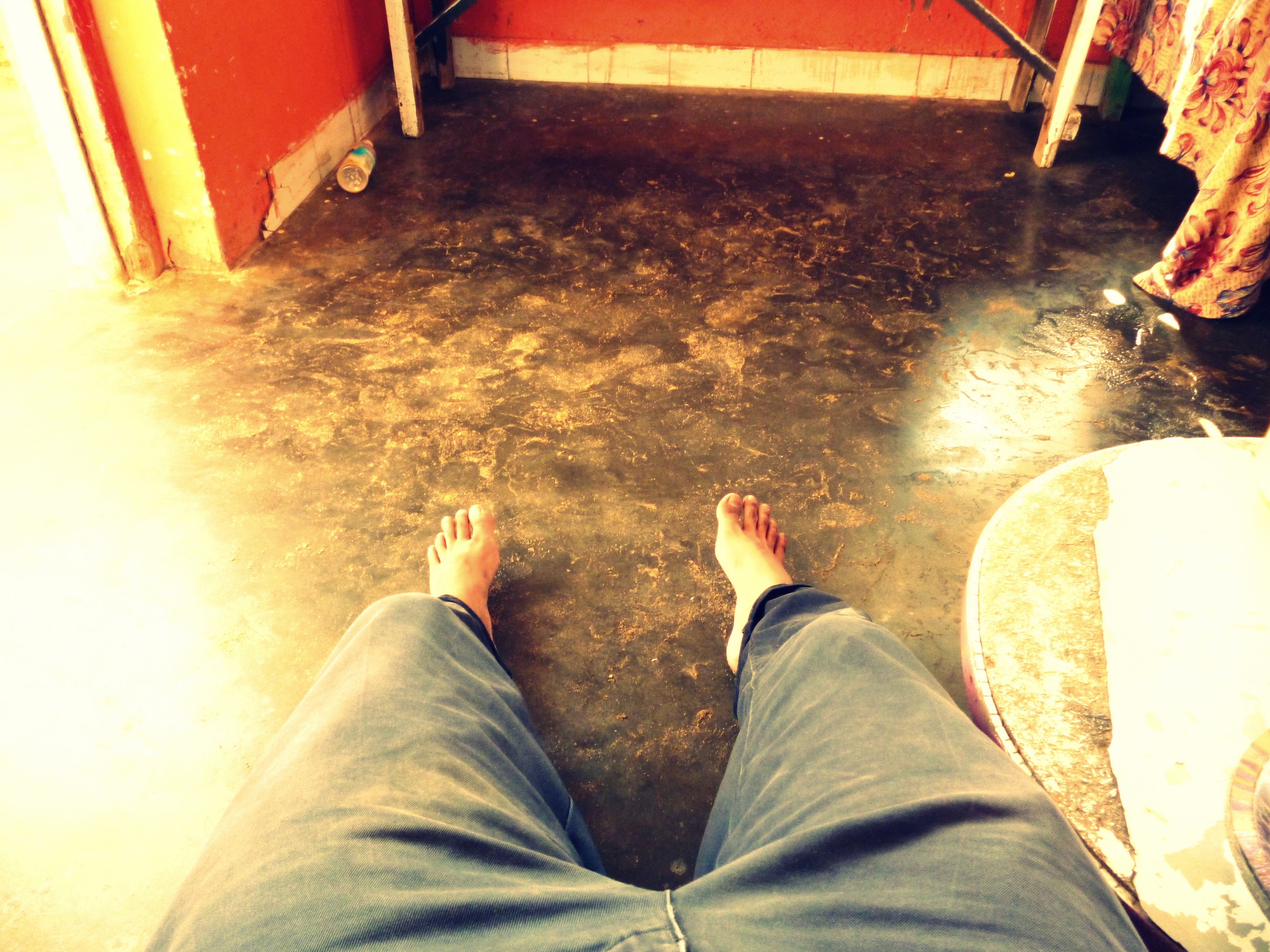 feet on a concrete floor