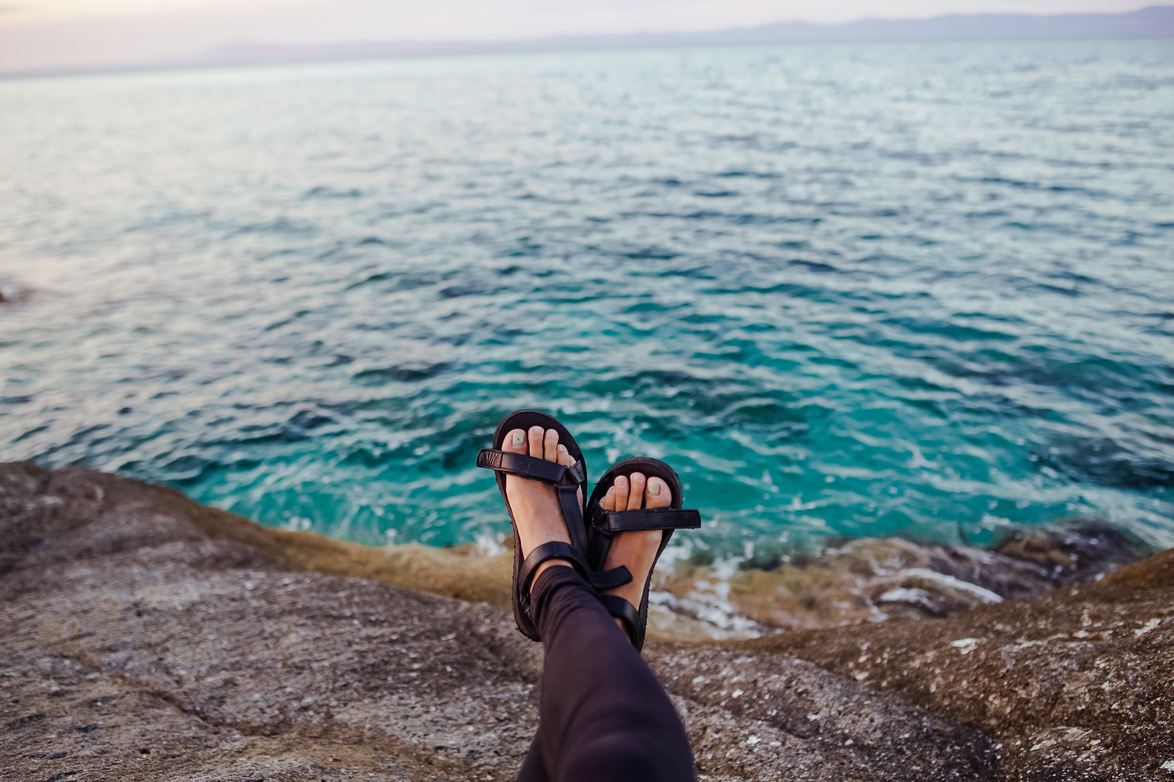 Feet on a rocky shore