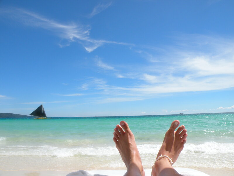 Feet on a tropical beach