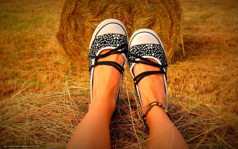 Feet on Hay Bale — Brown